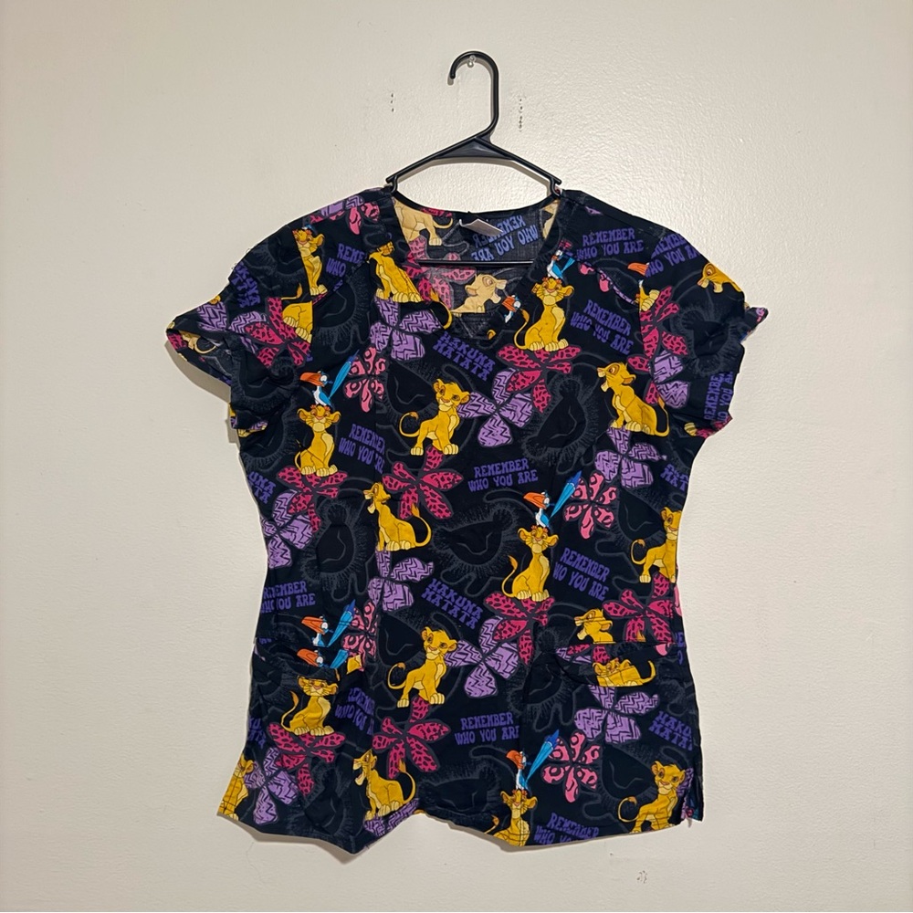 Disney  Lion King Short Sleeve Scrub top in Black, Yellow, Purple, Pink